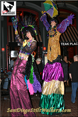 San Diego Mardi Gras stilt walkers